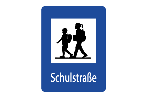 Das Verkehrszeichen zeigt Kinder mit Schultaschen
